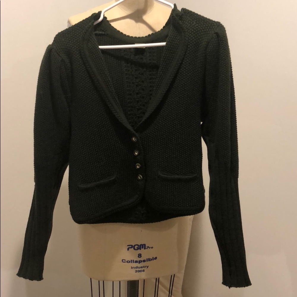 Olive green knitwear from a vintage shop in Italy